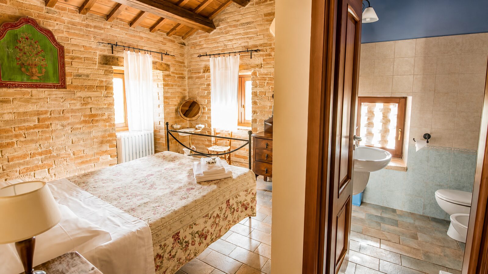 Bedroom with brick walls